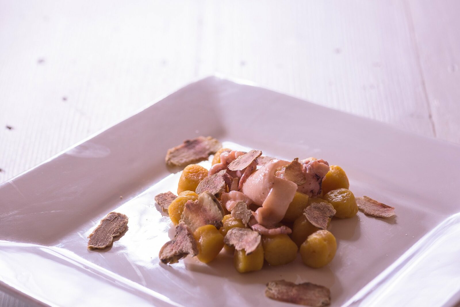 Pumpkin Gnocchi with Calamari and White Truffles